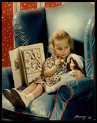 Girl Teaching Doll